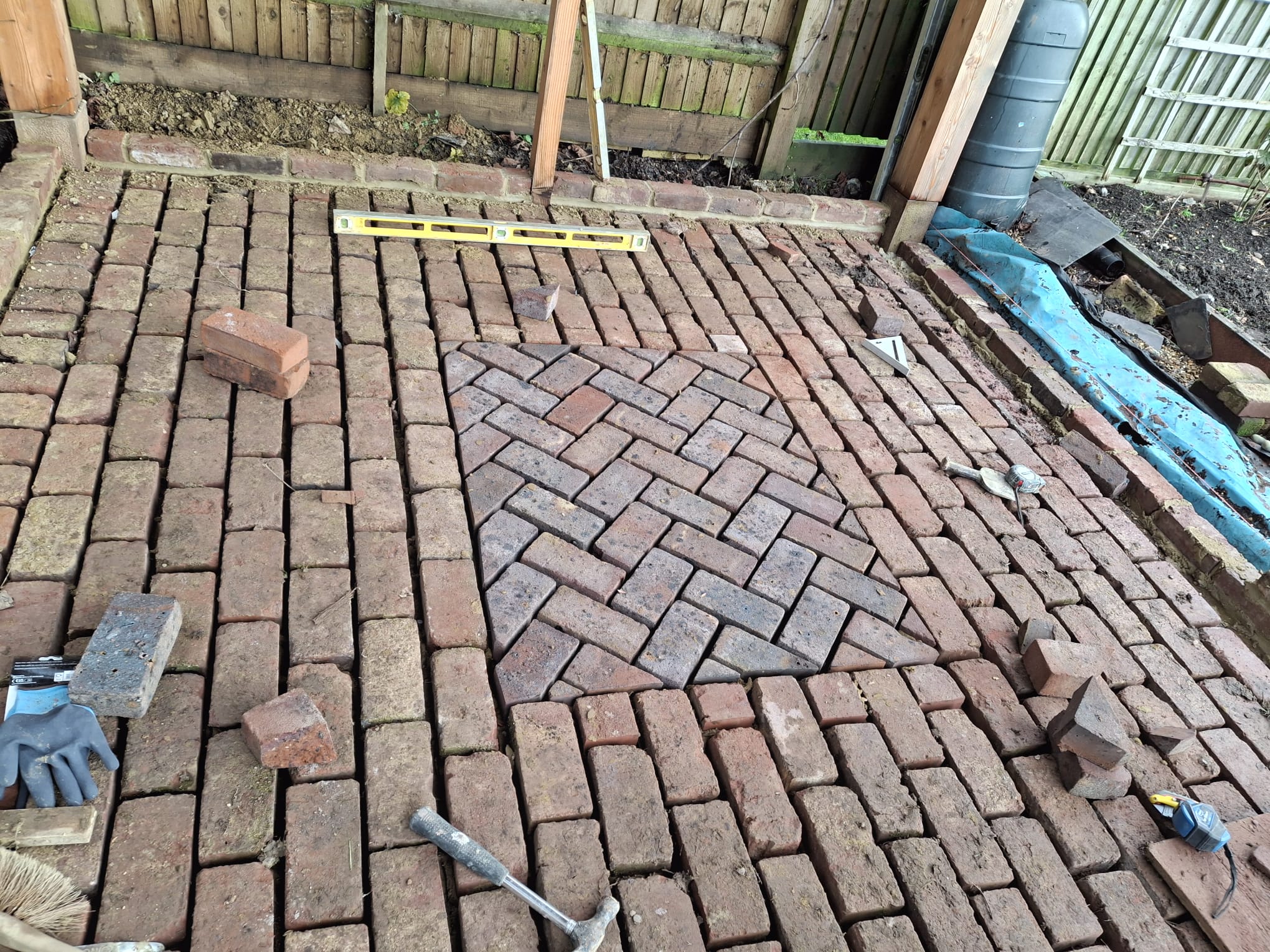 Herringbone brick paving and driveway
